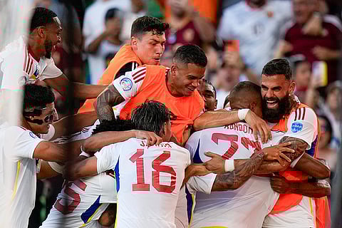 Venezuela's palyers celebrate a goal